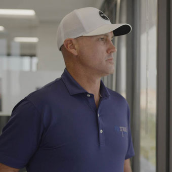 Greg Bartoli looking out window